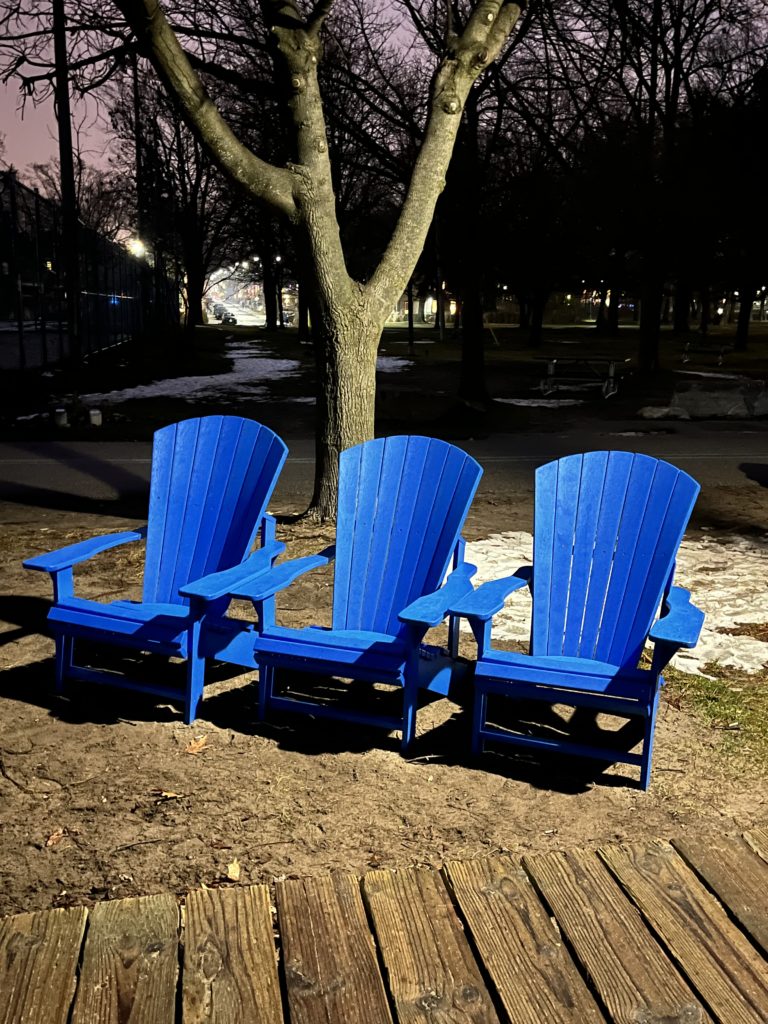 Decorative photo of three blue beach chairs